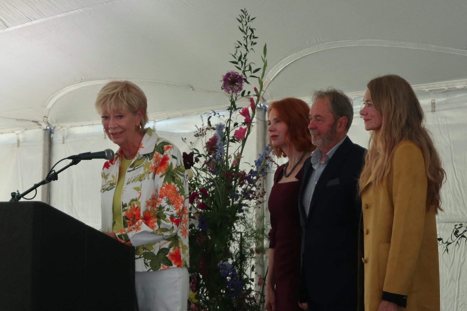 Judy Chant, wife of Davis R. Chant, thanked the hundreds of people who came to his public memorial service on May 21. She is flanked by her family, Holley Chant, Bruce Porter and Tamara Chant, who she said were responsible for warm community gathering.